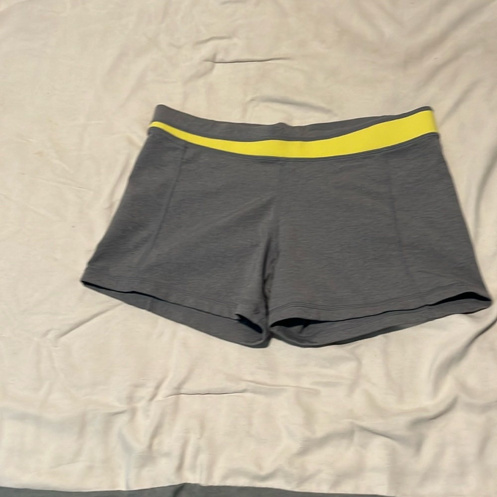 Lululemon workout shorts size 6 grey with yellow detailing